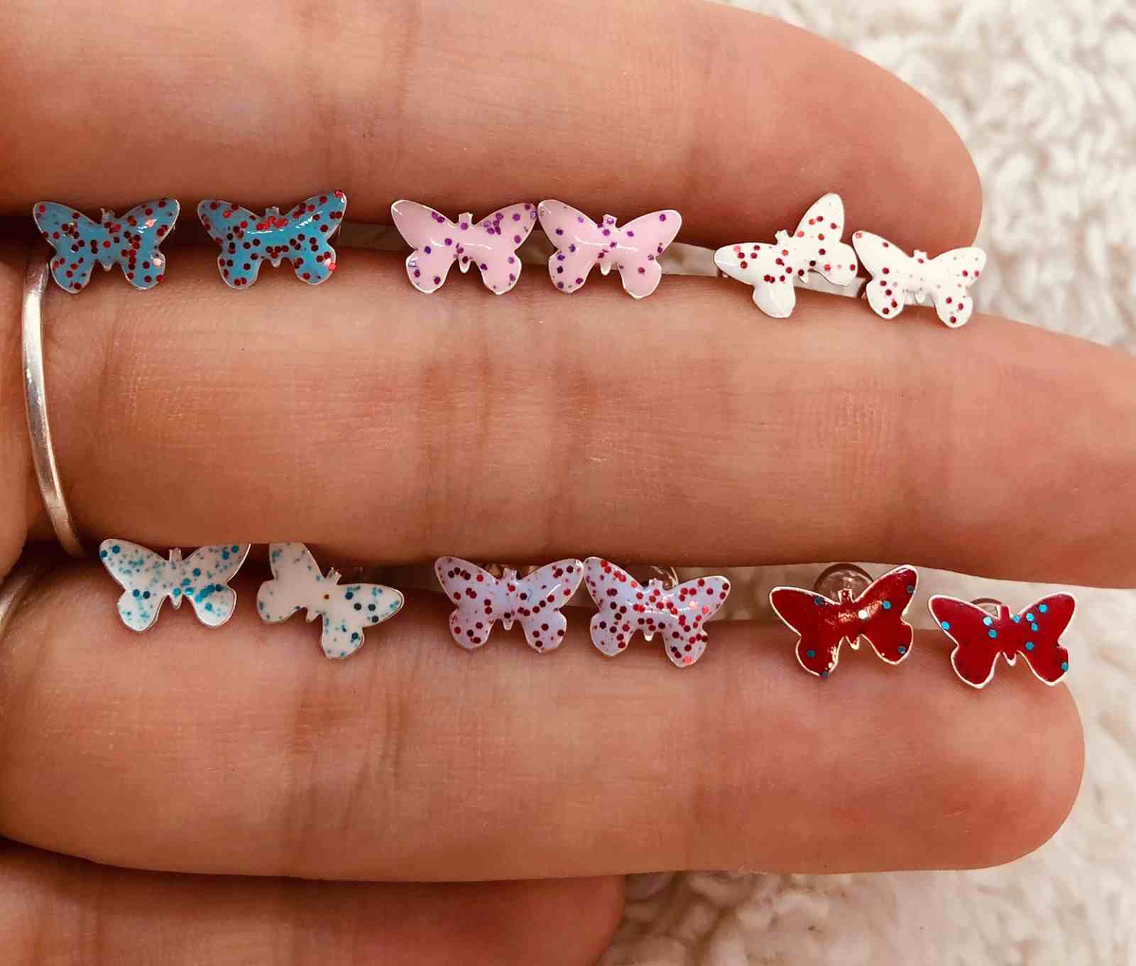 Aros abridores mariposas con esmalte y brillos