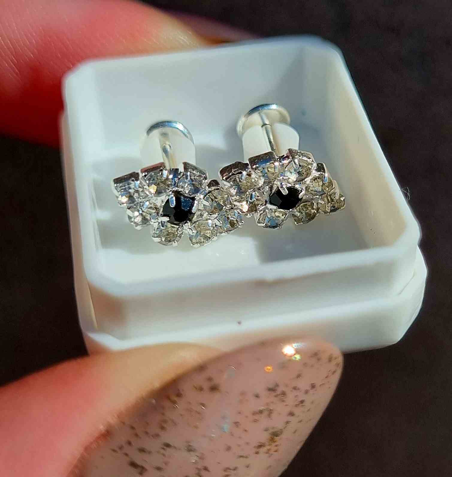 Abridores strass ojos negros